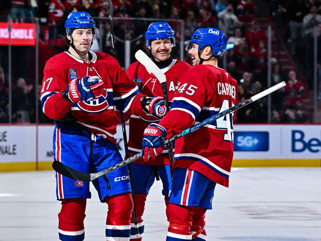 MONTREAL, CANADA - NOVEMBER 22: Josh Anderson #17 of the Montréal Canadiens celebrates his goal with teammates Mike Matheson #8 and Alexandre Carrier #45 during the second period against the Toronto Maple Leafs at the Bell Centre on November 22, 2025 in Montreal, Quebec, Canada.