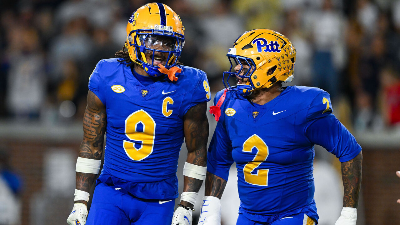 ATLANTA, GA - NOVEMBER 22: Pittsburgh linebacker Kyle Louis (9) and defensive lineman Isaiah Neal (2) react during the college football game between the Pittsburgh Panthers and the Georgia Tech Yellow Jackets on November 22nd, 2025 at Bobby Dodd Stadium in Atlanta, GA.