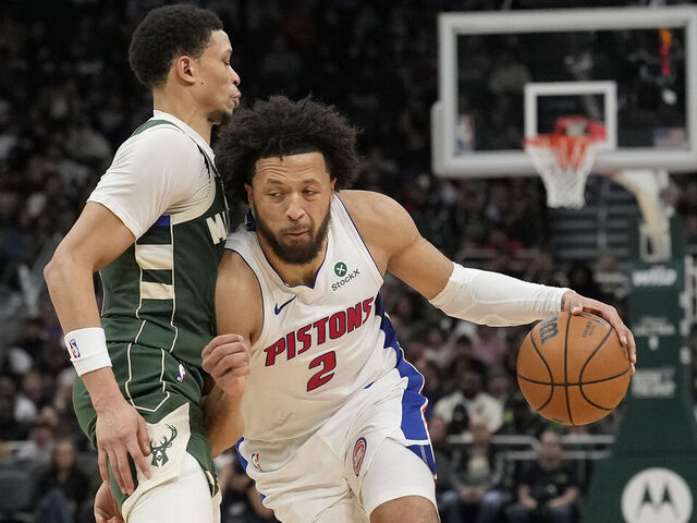 MILWAUKEE, WISCONSIN - NOVEMBER 22: Cade Cunningham #2 of the Detroit Pistons dribbles the ball against Ryan Rollins #13 of the Milwaukee Bucks during the third quarter at Fiserv Forum on November 22, 2025 in Milwaukee, Wisconsin.
