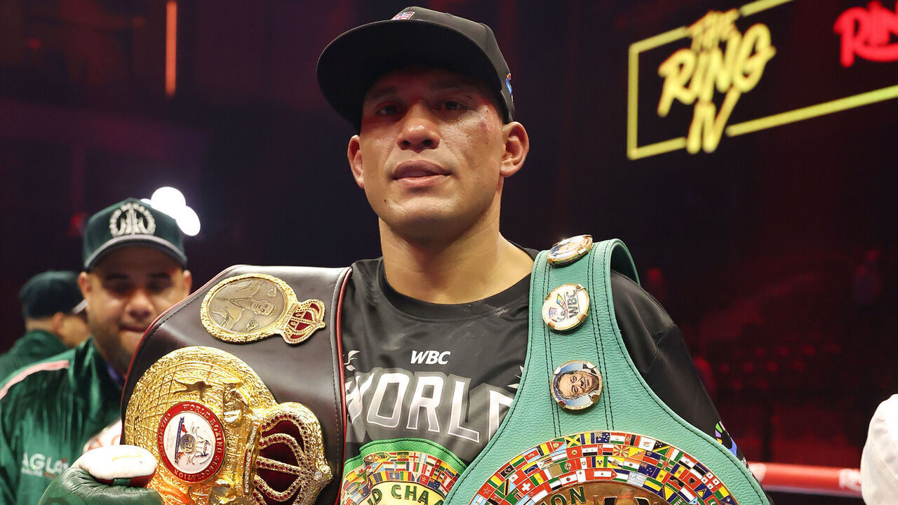 RIYADH, SAUDI ARABIA - NOVEMBER 22: David Benavidez poses with his title belts after defeating Anthony Yarde by TKO in round 7 in a WBC and WBA light-heavyweight title fight during Ring IV: Night of the Champions at ANB Arena on November 22, 2025 in Riyadh, Saudi Arabia.