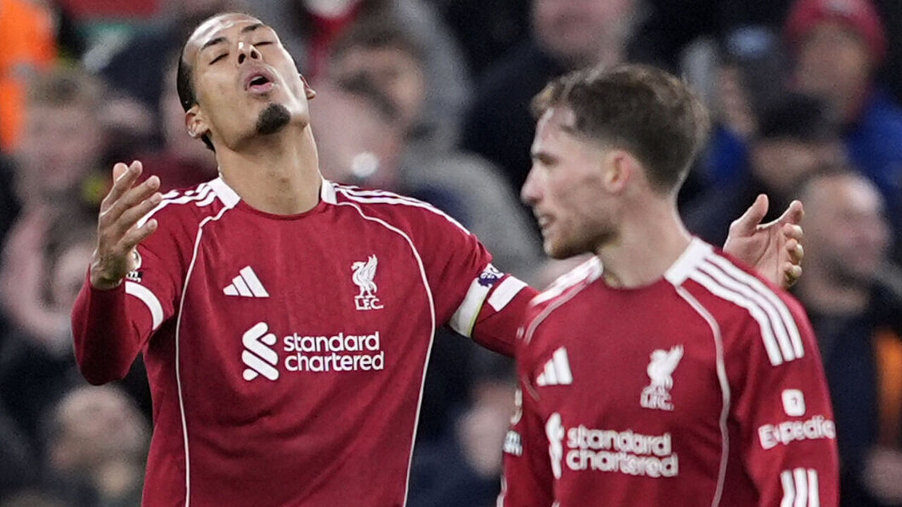 Liverpool's Virgil van Dijk (left) reacts during the Premier League match at Anfield, Liverpool. Picture date: Saturday November 22, 2025.