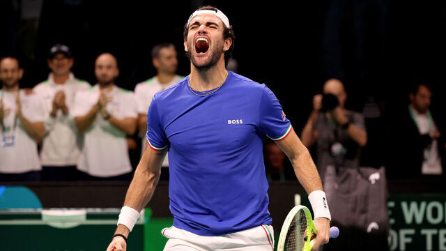 BOLOGNA, ITALY - NOVEMBER 23: Matteo Berrettini of Italy celebrates match point against Pablo Busta of Spain during the Davis Cup Final match between Italy and Spain at BolognaFiere Exhibition Centre on November 23, 2025 in Bologna, Italy.