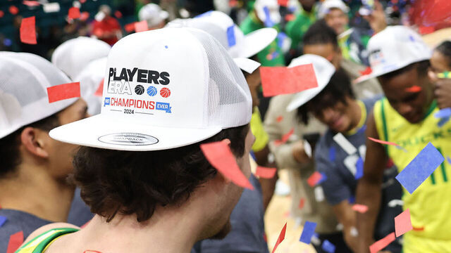 LAS VEGAS, NV - NOVEMBER 30: A general view of a champions hat worn by an Oregon Ducks player during a celebration after winning the championship game against the Alabama Crimson Tide 83-81 at the Players Era Festival on Saturday, Nov. 30, 2024, at the MGM Grand Garden Arena in Las Vegas, Nevada.
