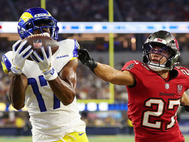 INGLEWOOD, CALIFORNIA - NOVEMBER 23: Davante Adams #17 of the Los Angeles Rams catches a touchdown pass against Zyon McCollum #27 of the Tampa Bay Buccaneers during the first quarter in the game at SoFi Stadium on November 23, 2025 in Inglewood, California.