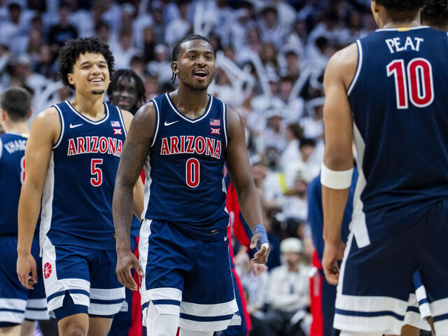 STORRS, CONNECTICUT - NOVEMBER 19: Brayden Burries #5 and Jaden Bradley #0 of the Arizona Wildcats react during the second half against the Connecticut Huskies at Harry A. Gampel Pavilion on November 19, 2025 in Storrs, Connecticut.