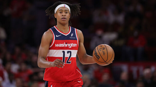 HOUSTON, TEXAS - NOVEMBER 12: Tre Johnson #12 of the Washington Wizards drives against the Houston Rockets during the first half at Toyota Center on November 12, 2025 in Houston, Texas.