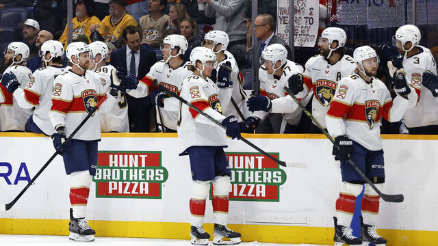 NASHVILLE, TENNESSEE - NOVEMBER 24: Sam Reinhart #13, Jeff Petry #2, Jesper Boqvist #70, and Uvis Balinskis #26 of the Florida Panthers celebrate after a goal during the first period of the game against the Nashville Predators at Bridgestone Arena on November 24, 2025 in Nashville, Tennessee.