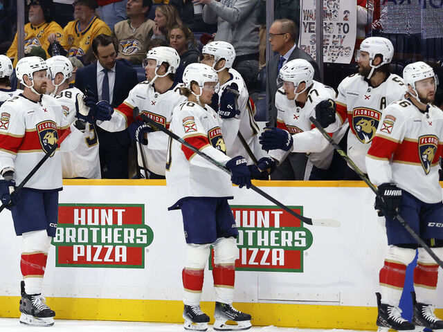 NASHVILLE, TENNESSEE - NOVEMBER 24: Sam Reinhart #13, Jeff Petry #2, Jesper Boqvist #70, and Uvis Balinskis #26 of the Florida Panthers celebrate after a goal during the first period of the game against the Nashville Predators at Bridgestone Arena on November 24, 2025 in Nashville, Tennessee.