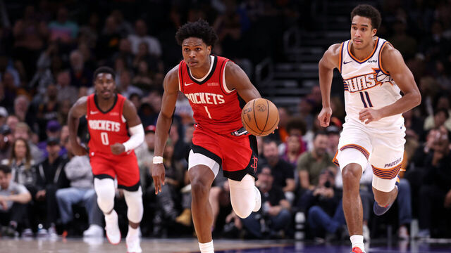 PHOENIX, ARIZONA - NOVEMBER 24: Amen Thompson #1 of the Houston Rockets dribbles the ball during the second half against the Phoenix Suns at Mortgage Matchup Center on November 24, 2025 in Phoenix, Arizona.