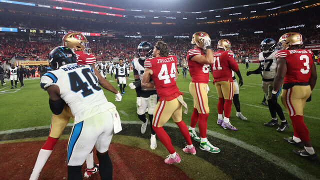 SANTA CLARA, CALIFORNIA - NOVEMBER 24: Jauan Jennings #15 of the San Francisco 49ers is separated from Tre'von Moehrig #7 of the Carolina Panthers after the game at Levi's Stadium on November 24, 2025 in Santa Clara, California.