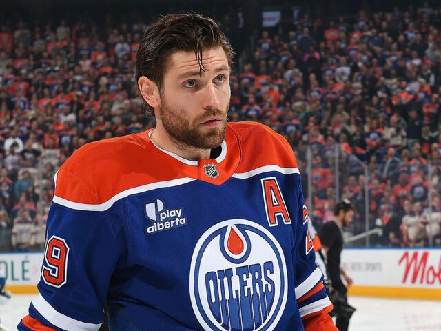 EDMONTON, CANADA - NOVEMBER 8: Leon Draisaitl #29 of the Edmonton Oilers stands for the singing of the national anthem prior to the game against the Colorado Avalanche at Rogers Place on November 8, 2025, in Edmonton, Alberta, Canada.