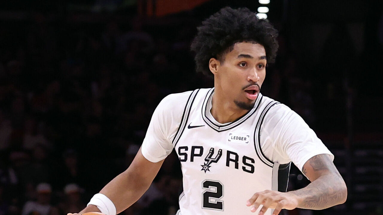 PHOENIX, ARIZONA - NOVEMBER 02: Dylan Harper #2 of the San Antonio Spurs dribbles the ball during the first half against the Phoenix Suns at Mortgage Matchup Center on November 02, 2025 in Phoenix, Arizona. The Suns defeated the Spurs 130-118.