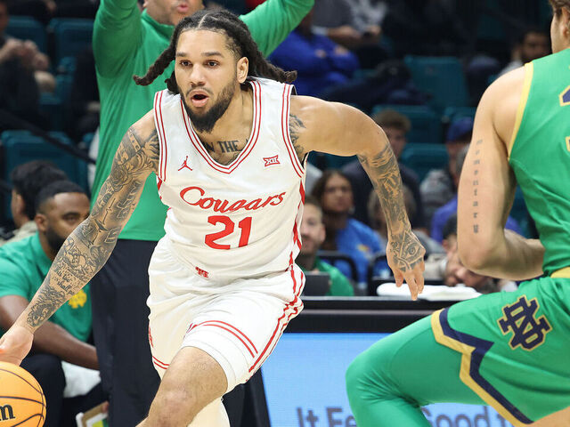 LAS VEGAS, NV - NOVEMBER 26: Houston Cougars guard Emanuel Sharp (21) in action during the Players Era Festival on Wednesday, Nov. 26, 2025, at the Michelob ULTRA Arena at Mandalay Bay Resort and Casino in Las Vegas, NV.