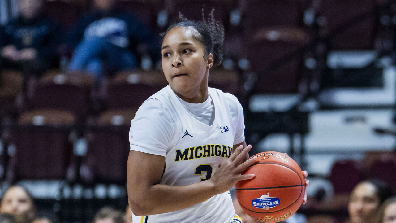 UNCASVILLE, CONNECTICUT - NOVEMBER 23: Mila Holloway #3 of the Michigan Wolverines plays against the Syracuse Orange during the first half of an Invesco QQQ Basketball Hall of Fame Women’s Showcase game at Mohegan Sun on November 23, 2025 in Uncasville, Connecticut.