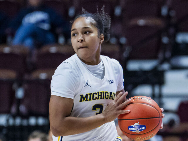 UNCASVILLE, CONNECTICUT - NOVEMBER 23: Mila Holloway #3 of the Michigan Wolverines plays against the Syracuse Orange during the first half of an Invesco QQQ Basketball Hall of Fame Women’s Showcase game at Mohegan Sun on November 23, 2025 in Uncasville, Connecticut.