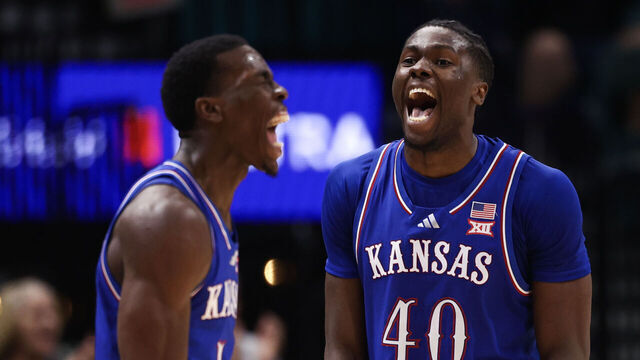 LAS VEGAS, NEVADA - NOVEMBER 26: Flory Bidunga #40 and Melvin Council Jr. #14 of the Kansas Jayhawks react during the second half against the Tennessee Volunteers during the Players Era Championship basketball tournament at MGM Grand Garden Arena on November 26, 2025 in Las Vegas, Nevada.
