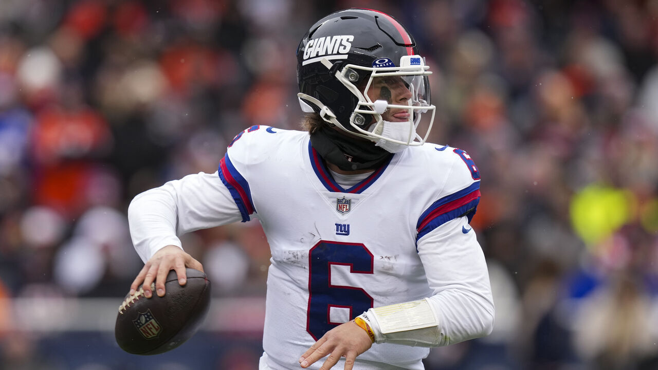 CHICAGO, ILLINOIS - NOVEMBER 9: Jaxson Dart #6 of the New York Giants looks to pass the ball during the first half of an NFL football game against the Chicago Bears at Solider Field on November 9, 2025 in Chicago, Illinois.