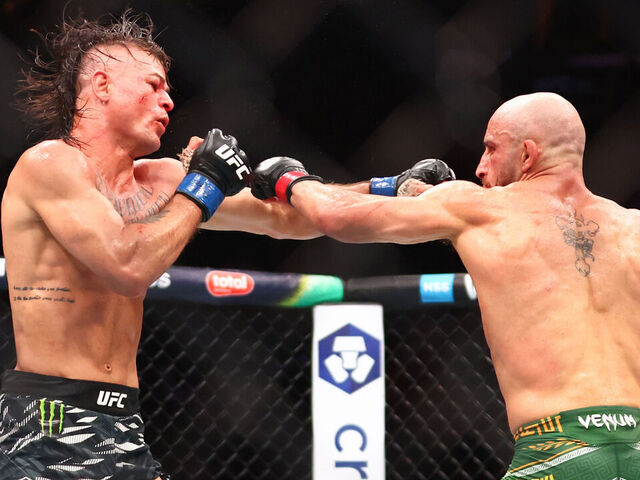 MIAMI, FLORIDA - APRIL 12: Diego Lopes of Brazil (L) fights Alexander Volkanovski of Australia in a featherweight title fight during UFC 314 at Kaseya Center on April 12, 2025 in Miami, Florida.