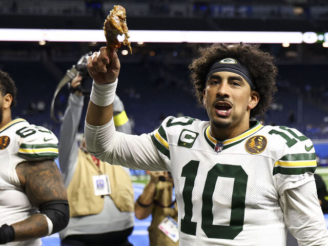 DETROIT, MICHIGAN - NOVEMBER 27: Jordan Love #10 of the Green Bay Packers celebrates with a turkey leg after an NFL football game on Thanksgiving Day against the Detroit Lions at Ford Field on November 27, 2025 in Detroit, Michigan.