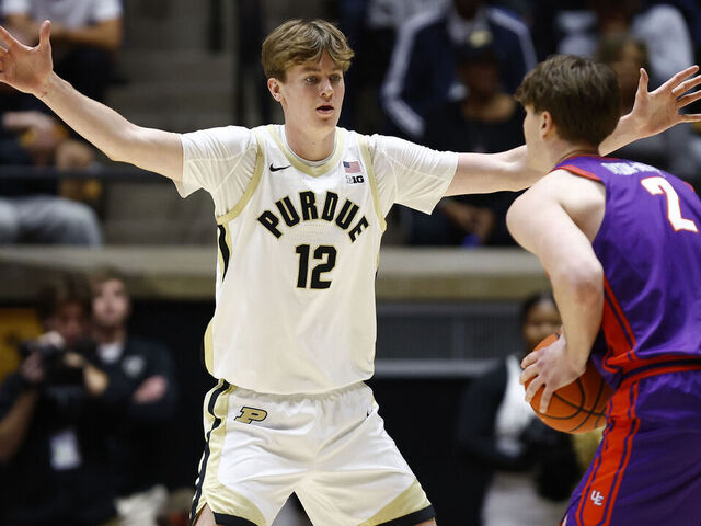 WEST LAFAYETTE, IN - NOVEMBER 04: Purdue Boilermakers center Daniel Jacobsen (12) defends Evansville Purple Aces forward James Dyson-Merwe (2) during a college basketball game between the Evansville Purple Aces and the Purdue Boilermakers on November 04,2025 at Mackey Arena in West Lafayette, IN.