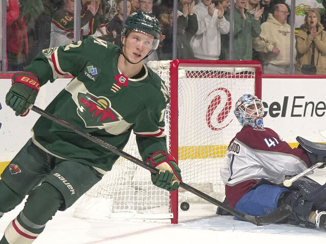 SAINT PAUL, MN - NOVEMBER 28: Matt Boldy #12 of the Minnesota Wild scores an overtime shootout goal against Scott Wedgewood #41 of the Colorado Avalanche at Grand Casino Arena on November 28, 2025 in Saint Paul, Minnesota.