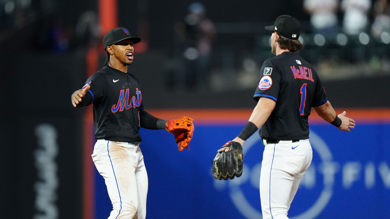 NEW YORK, NY - JULY 02: Francisco Lindor #12 and Jeff McNeil #1 of the New York Mets celebrate after winning the game between the Milwaukee Brewers and the New York Mets at Citi Field on Wednesday, July 2, 2025 in New York, New York.