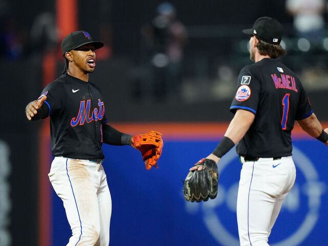 NEW YORK, NY - JULY 02: Francisco Lindor #12 and Jeff McNeil #1 of the New York Mets celebrate after winning the game between the Milwaukee Brewers and the New York Mets at Citi Field on Wednesday, July 2, 2025 in New York, New York.