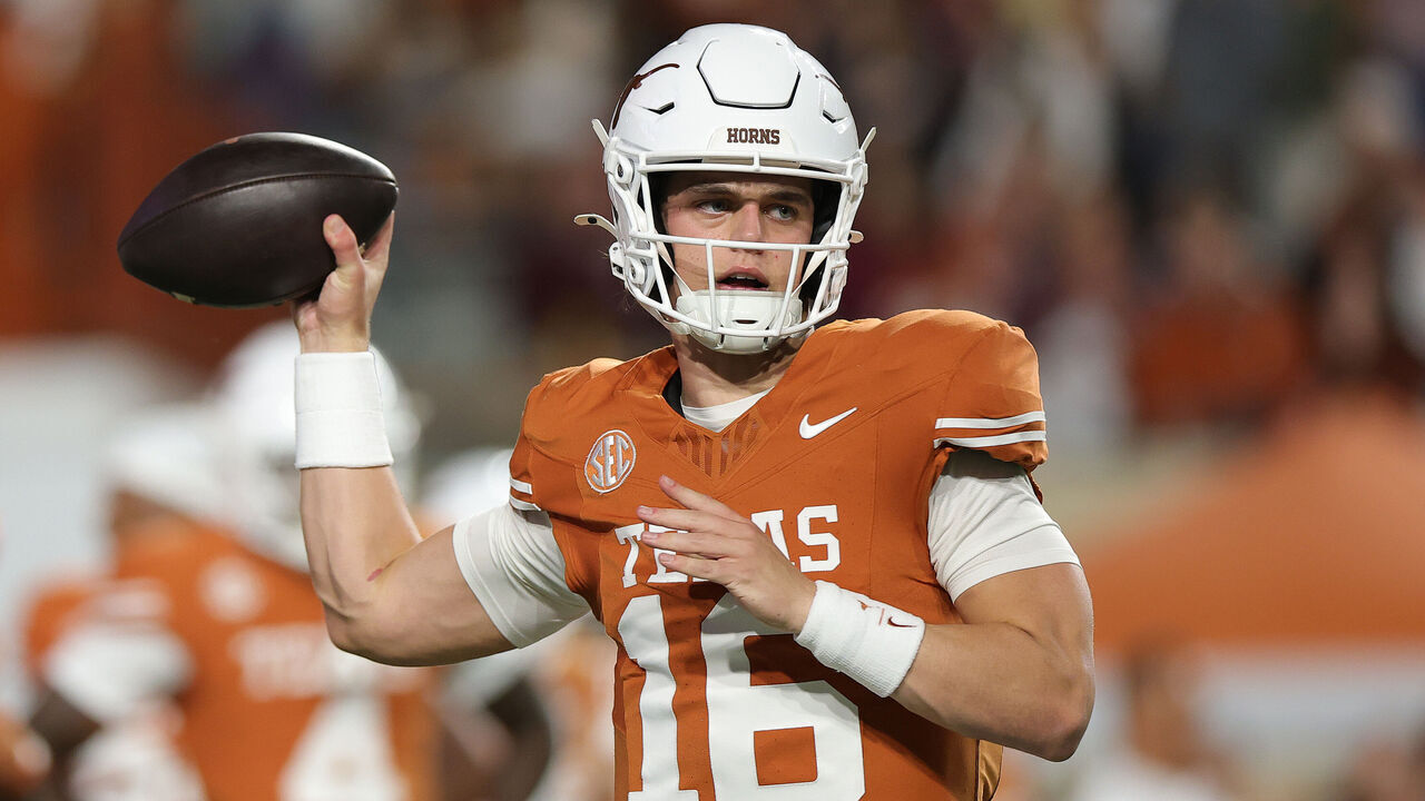 AUSTIN, TEXAS - NOVEMBER 28: Arch Manning #16 of the Texas Longhorns warms up prior to a game against the Texas A&M Aggies at Darrell K Royal-Texas Memorial Stadium on November 28, 2025 in Austin, Texas.