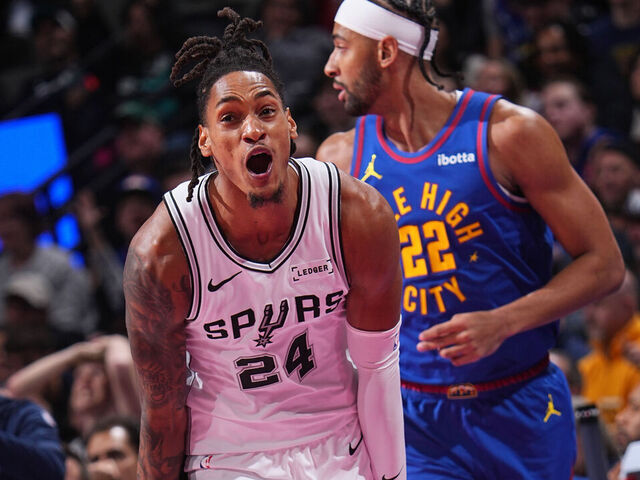 DENVER, CO - NOVEMBER 28: Devin Vassell #24 of the San Antonio Spurs celebrates during the game against the Denver Nuggets during the 2025-26 Emirates Cup on November 28, 2025 at Ball Arena in Denver, Colorado. NOTE TO USER: User expressly acknowledges and agrees that, by downloading and/or using this Photograph, user is consenting to the terms and conditions of the Getty Images License Agreement. Mandatory Copyright Notice: Copyright 2025 NBAE