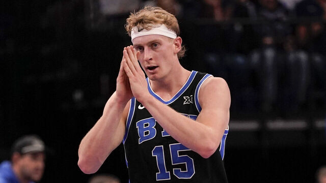 SALT LAKE CITY, UT - NOVEMBER 21: Richie Saunders #15 of the BYU Cougars reacts during a college basketball game between the Wisconsin Badgers and the BYU Cougars at the Delta Center, in Salt Lake City, UT.