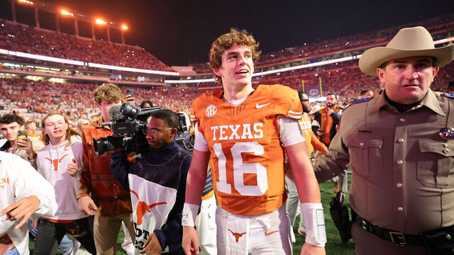 AUSTIN, TEXAS - NOVEMBER 28: Arch Manning #16 of the Texas Longhorns walks off the field after beating the Texas A&M Aggies 27-17 at Darrell K Royal-Texas Memorial Stadium on November 28, 2025 in Austin, Texas.