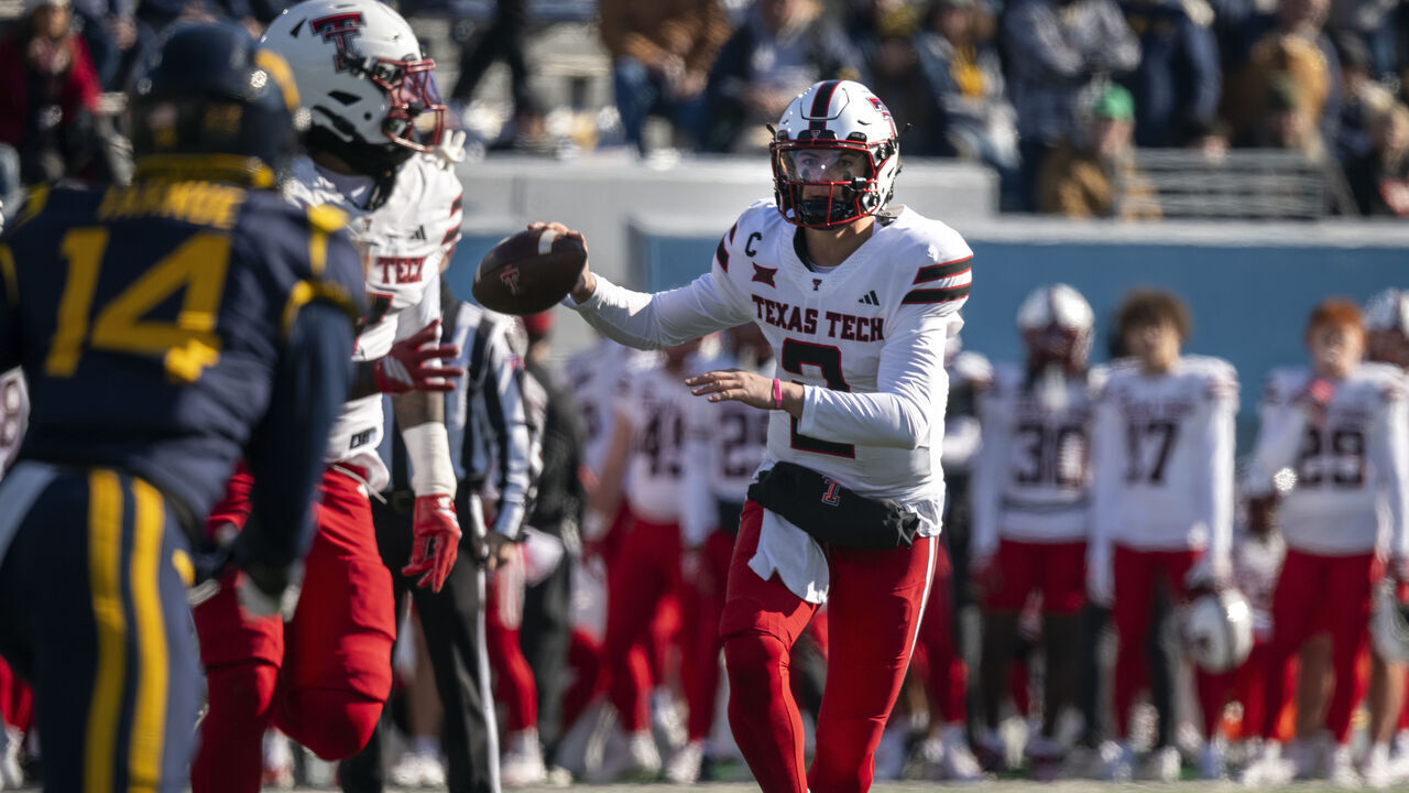 MORGANTOWN, WEST VIRGINIA - NOVEMBER 29: Behren Morton #2 of the Texas Tech Red Raiders in action in the first quarter during a game against the West Virginia Mountaineers at Milan Puskar Stadium on November 29, 2025 in Morgantown, West Virginia.