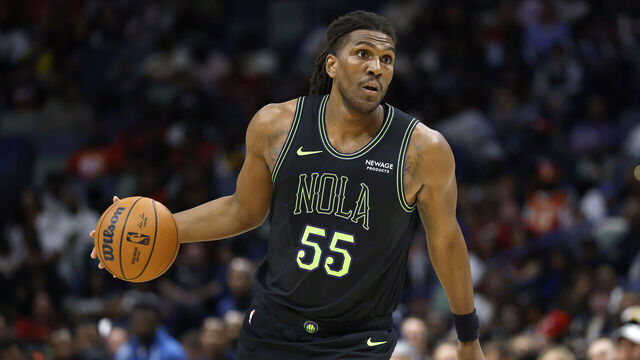 NEW ORLEANS, LOUISIANA - NOVEMBER 22: Kevon Looney #55 of the New Orleans Pelicans drives to the basket during the second half of a game against the Atlanta Hawks at Smoothie King Center on November 22, 2025 in New Orleans, Louisiana.