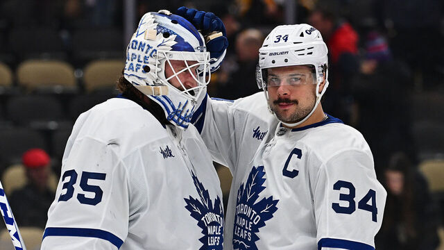 PITTSBURGH, PENNSYLVANIA - NOVEMBER 29: Auston Matthews #34 of the Toronto Maple Leafs celebrates with Dennis Hildeby #35 following a 7-2 win over the Pittsburgh Penguins during the game at PPG PAINTS Arena on November 29, 2025 in Pittsburgh, Pennsylvania.