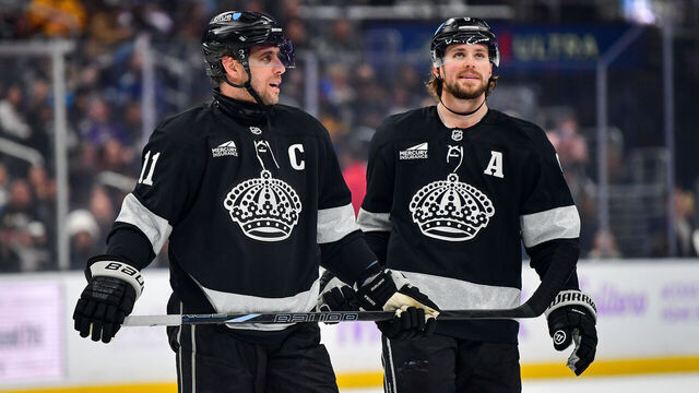 LOS ANGELES, CA - NOVEMBER 29: Anze Kopitar #11 and Adrian Kempe #9 of the Los Angeles Kings look on during the first period against the Vancouver Canucks at Crypto.com Arena on November 29, 2025 in Los Angeles, California.