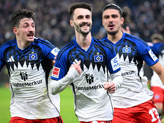 HAMBURG, GERMANY - NOVEMBER 30: Fabio Vieira of Hamburger SV celebrates scoring his team's second goal with teammates Guilherme Ramos and Giorgi Gocholeishvili during the Bundesliga match between Hamburger SV and VfB Stuttgart at Volksparkstadion on November 30, 2025 in Hamburg, Germany.