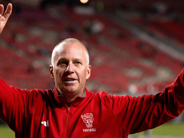RALEIGH, NORTH CAROLINA - NOVEMBER 1: Head coach Dave Doeren of the NC State Wolfpack fires up the crown prior to the game against the Georgia Tech Yellow Jackets at Carter-Finley Stadium on November 1, 2025 in Raleigh, North Carolina.