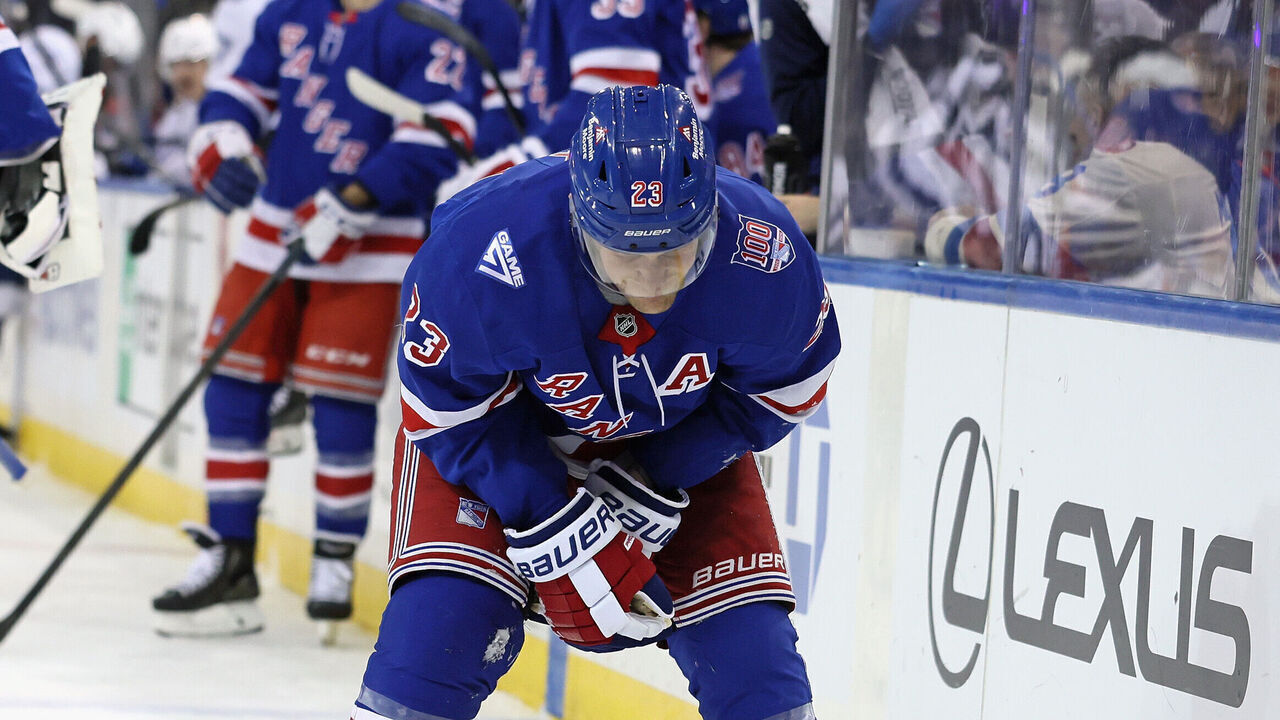 NEW YORK, NEW YORK - NOVEMBER 29: Adam Fox #23 of the New York Rangers is injured during the third period against the Tampa Bay Lightning at Madison Square Garden on November 29, 2025 in New York City. The Lightning defeated the Rangers 4-1.