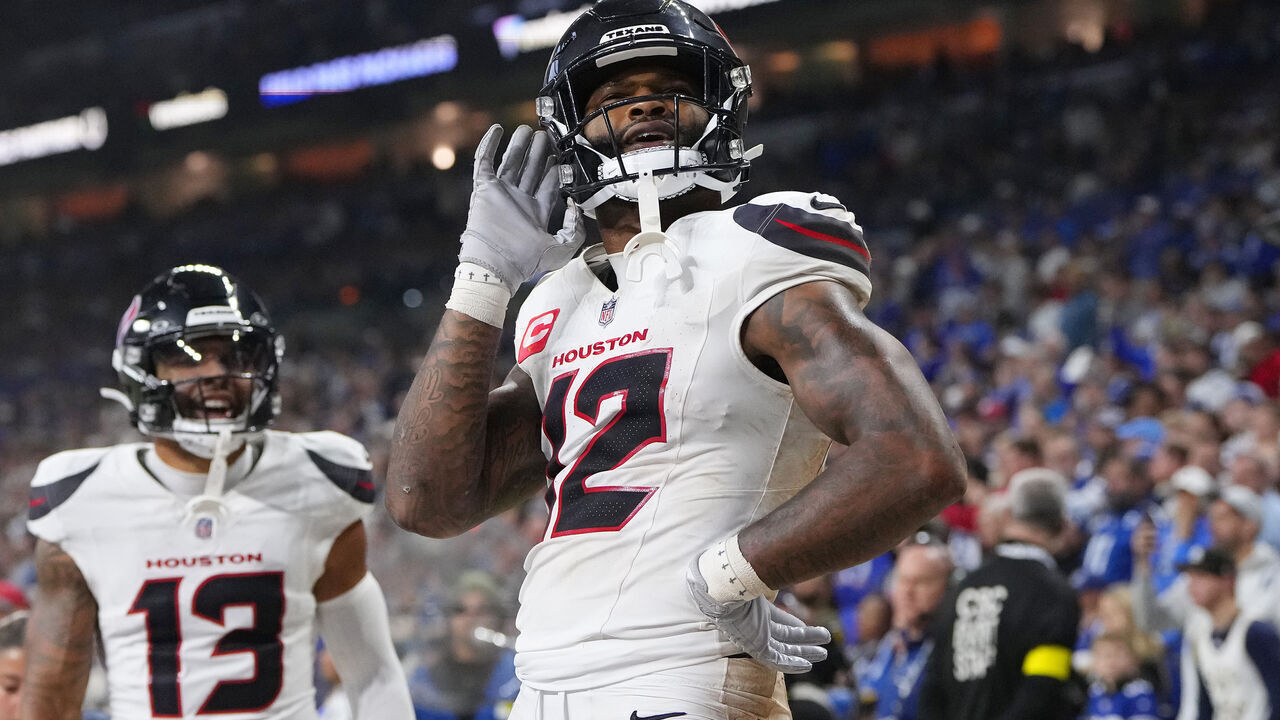 INDIANAPOLIS, INDIANA - NOVEMBER 30: Nico Collins #12 of the Houston Texans celebrates after his rushing touchdown against the Indianapolis Colts during the fourth quarter at Lucas Oil Stadium on November 30, 2025 in Indianapolis, Indiana.