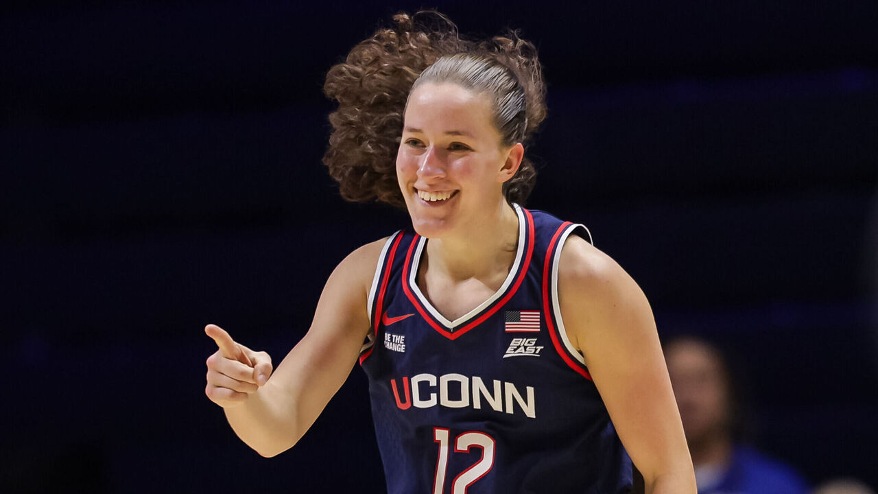 CINCINNATI, OHIO - NOVEMBER 30: Ashlynn Shade #12 of the UConn Huskies reacts during the first half of the NCAA women's basketball game between the Xavier Musketeers and the UCONN Huskies at Cintas Center on November 30, 2025 in Cincinnati, Ohio.
