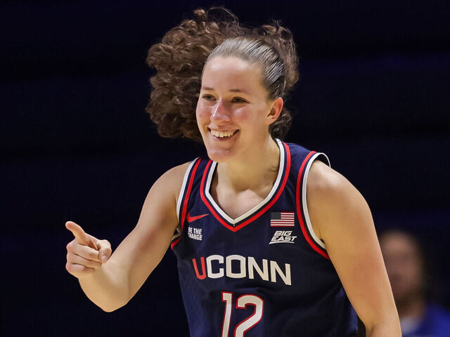 CINCINNATI, OHIO - NOVEMBER 30: Ashlynn Shade #12 of the UConn Huskies reacts during the first half of the NCAA women's basketball game between the Xavier Musketeers and the UCONN Huskies at Cintas Center on November 30, 2025 in Cincinnati, Ohio.