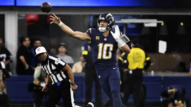 Inglewood, CA - November 30: Quarterback Justin Herbert #10 of the Los Angeles Chargers passes against the Las Vegas Raiders in the second half of an NFL football game at SoFi Stadium in Inglewood on Sunday, November 30, 2025.