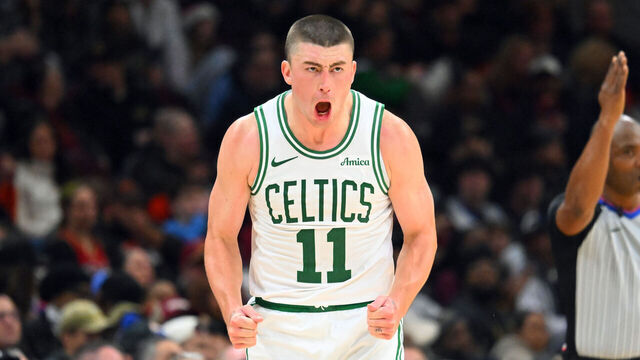 CLEVELAND, OHIO - NOVEMBER 30: Payton Pritchard #11 of the Boston Celtics reacts after scoring during the fourth quarter against the Cleveland Cavaliers at Rocket Arena on November 30, 2025 in Cleveland, Ohio. The Celtics defeated the Cavaliers 117-115.