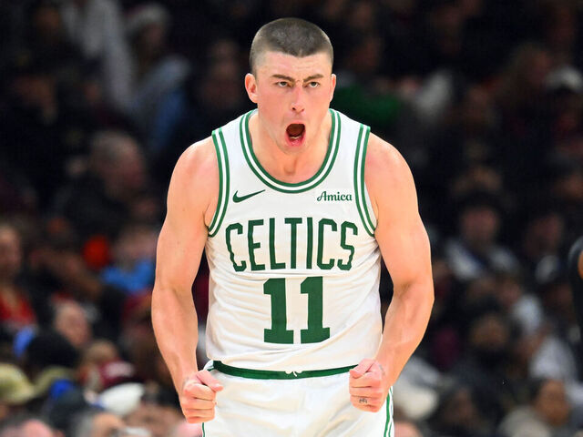 CLEVELAND, OHIO - NOVEMBER 30: Payton Pritchard #11 of the Boston Celtics reacts after scoring during the fourth quarter against the Cleveland Cavaliers at Rocket Arena on November 30, 2025 in Cleveland, Ohio. The Celtics defeated the Cavaliers 117-115.