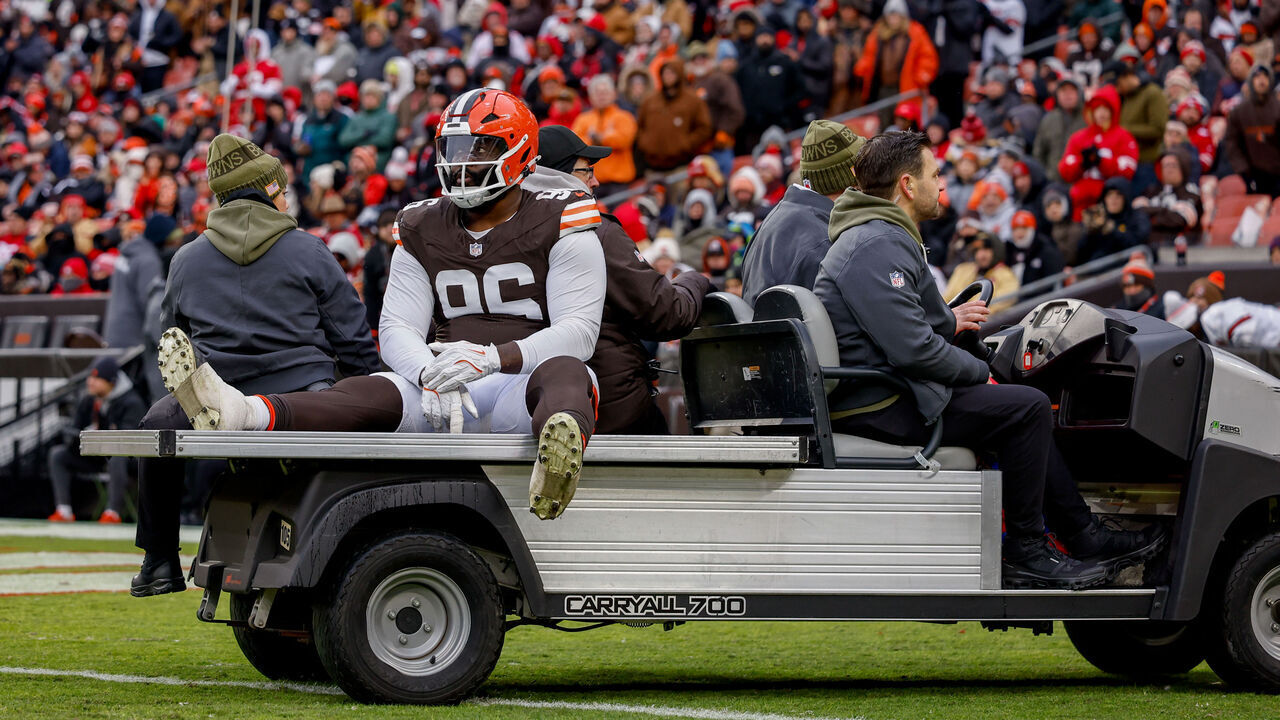 CLEVELAND, OHIO - NOVEMBER 30: Maliek Collins #96 of the Cleveland Browns gets carted off the field during the third quarter of the NFL 2025 game against the San Francisco 49ers at Huntington Bank Field on November 30, 2025 in Cleveland, Ohio.
