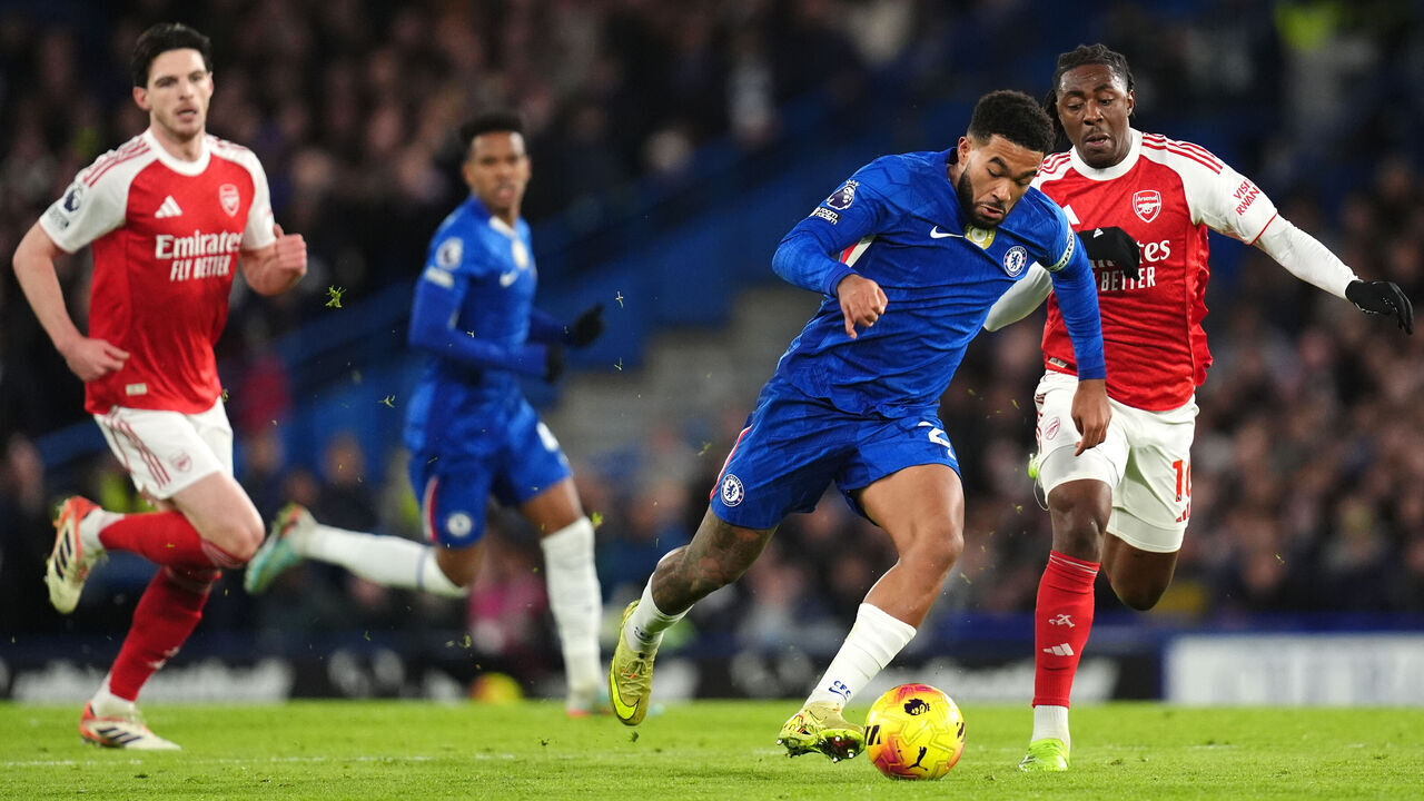 Chelsea's Reece James and Arsenal's Eberechi Eze (right) battle for the ball during the Premier League match at Stamford Bridge, London. Picture date: Sunday November 30, 2025.