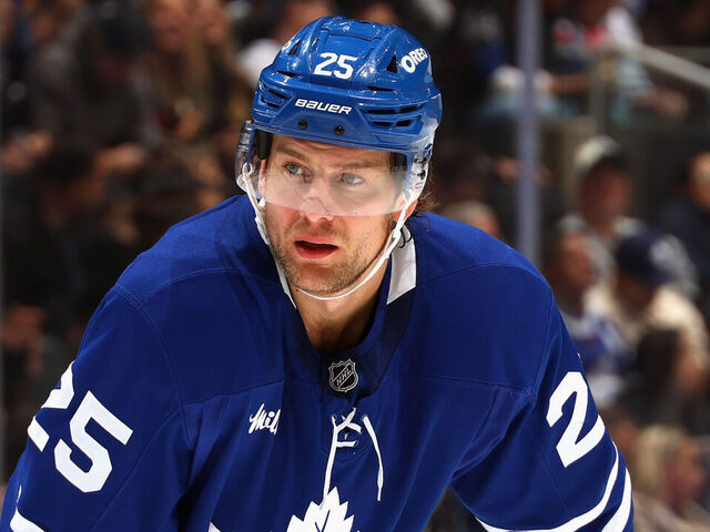 TORONTO, CANADA - NOVEMBER 08: Brandon Carlo #25 of the Toronto Maple Leafs skates against the Boston Bruins at Scotiabank Arena on November 08, 2025 in Toronto, Ontario, Canada.