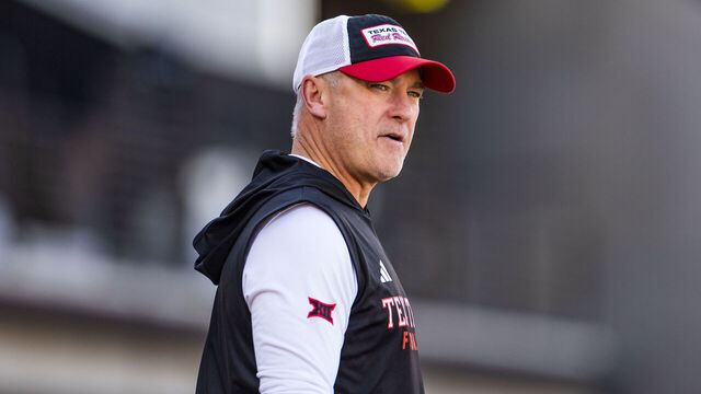 LUBBOCK, TEXAS - NOVEMBER 15: Head Coach Joey McGuire of the Texas Tech Red Raiders walks across the field before the game against the UCF Knights at Jones AT&T Stadium on November 15, 2025 in Lubbock, Texas.