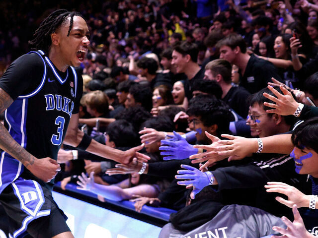 DURHAM, NORTH CAROLINA - DECEMBER 2: Isaiah Evans #3 of the Duke Blue Devils celebrates with the Cameron Crazies following their win against the Florida Gators at Cameron Indoor Stadium on December 2, 2025 in Durham, North Carolina.