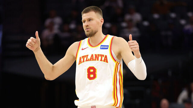 SACRAMENTO, CALIFORNIA - NOVEMBER 12: Kristaps Porzingis #8 of the Atlanta Hawks reacts after the Hawks made a basket against the Sacramento Kings during the second half at Golden 1 Center on November 12, 2025 in Sacramento, California. NOTE TO USER: User expressly acknowledges and agrees that, by downloading and/or using this photograph, user is consenting to the terms and conditions of the Getty Images License Agreement.